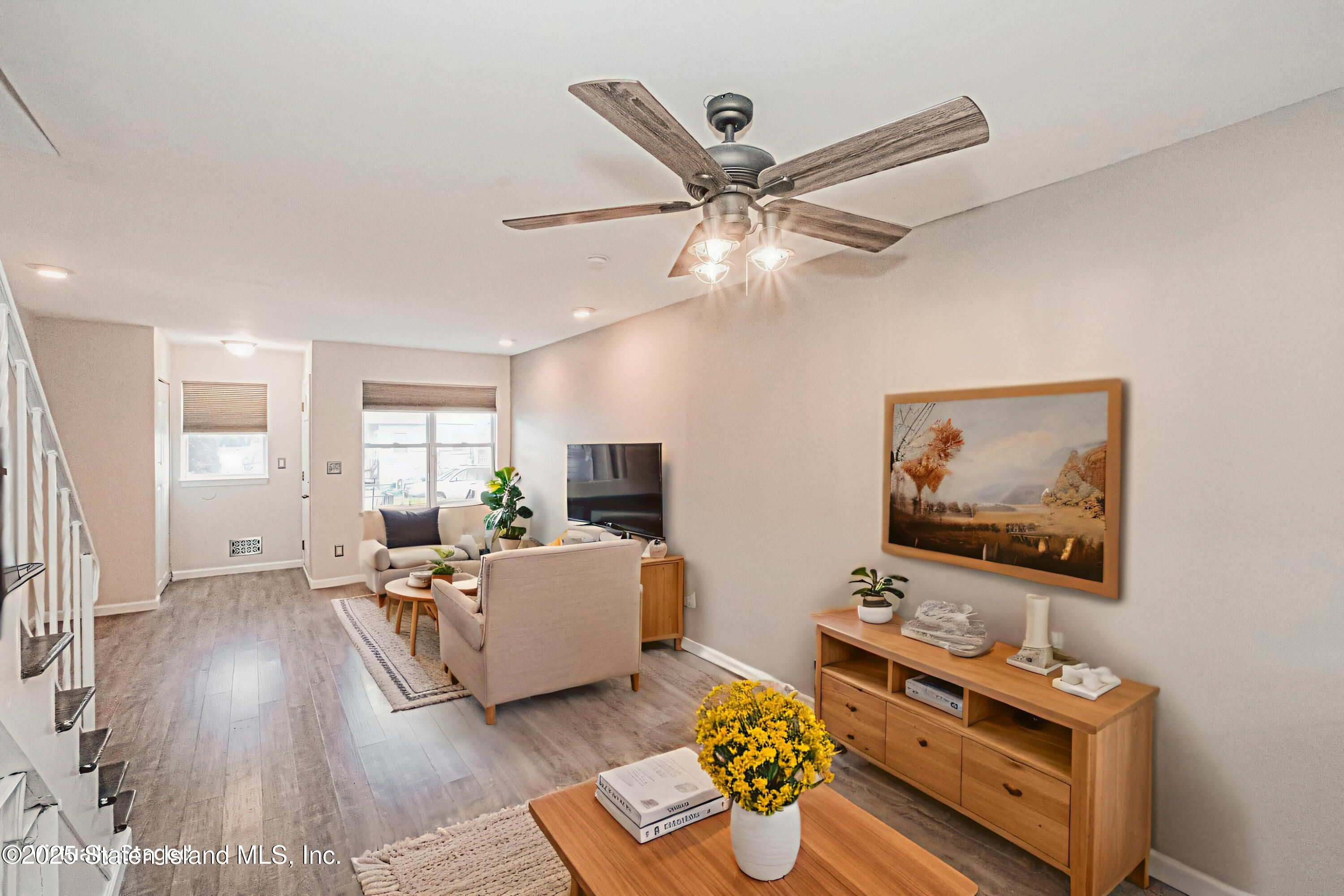 34 Lorraine Loop Staten Island, NY 10309 - Photo 7 of 33 a living room with furniture and a window