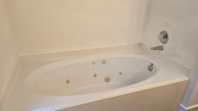 a bathroom with bathtub