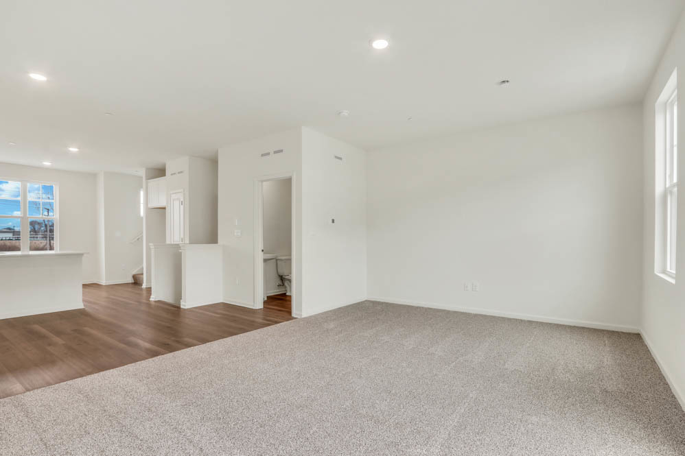 567 Yosemite Way Mundelein, IL 60060 - Photo 13 of 58 a view of empty room with wooden floor
