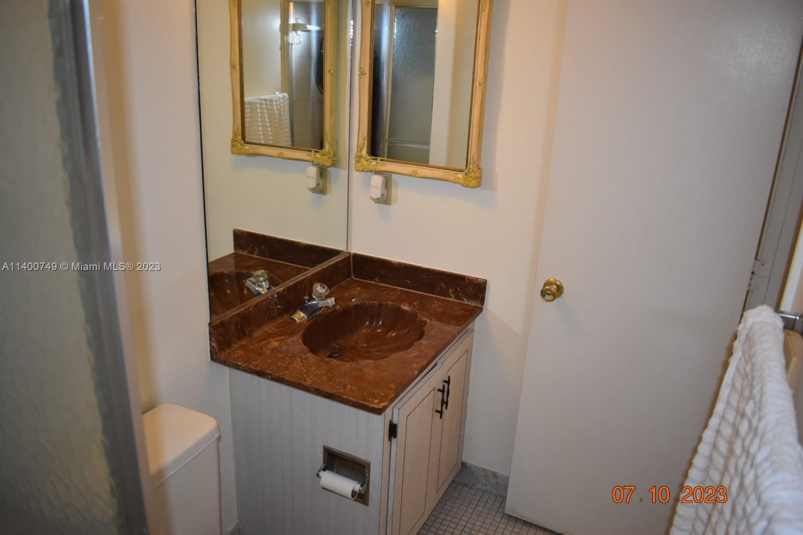3501 Inverrary Drive, Unit 204 Lauderhill, FL 33319 - Photo 9 of 18 a utility room with dryer and washer