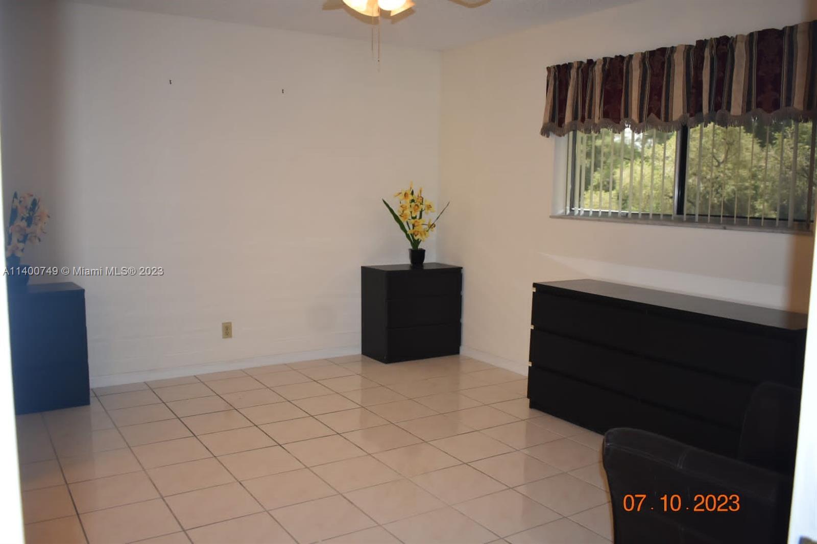 3501 Inverrary Drive, Unit 204 Lauderhill, FL 33319 - Photo 10 of 18 a living room with furniture