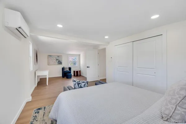 a bed room with a bed and window