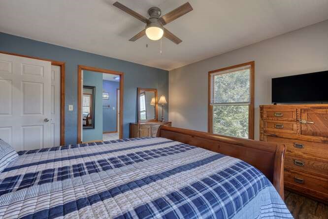 1995 River Hill Road Murphy, NC 28906 - Photo 21 of 68 a bedroom with a bed and a flat screen tv