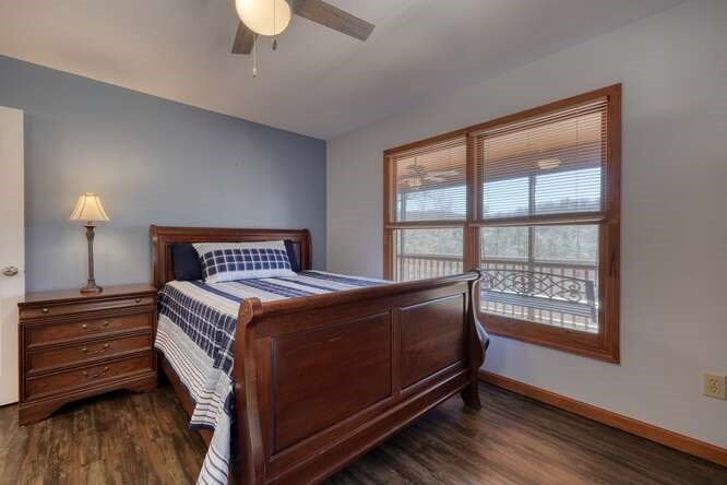 1995 River Hill Road Murphy, NC 28906 - Photo 26 of 68 a bedroom with a bed and a window