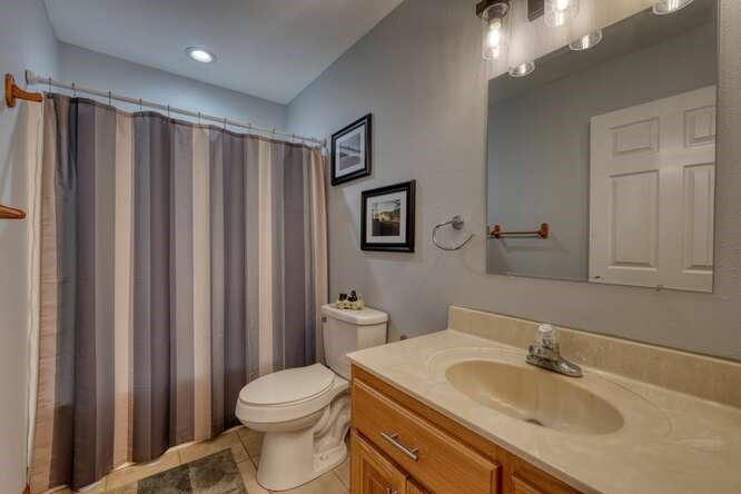 1995 River Hill Road Murphy, NC 28906 - Photo 27 of 68 a bathroom with a sink a toilet and mirror