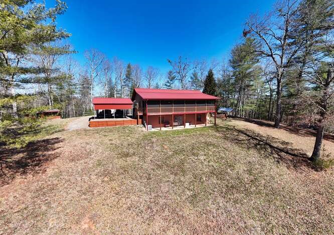 1995 River Hill Road Murphy, NC 28906 - Photo 3 of 68 a view of a house with a yard and sitting area