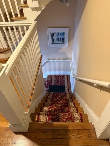 a view of a fireplace in an empty room