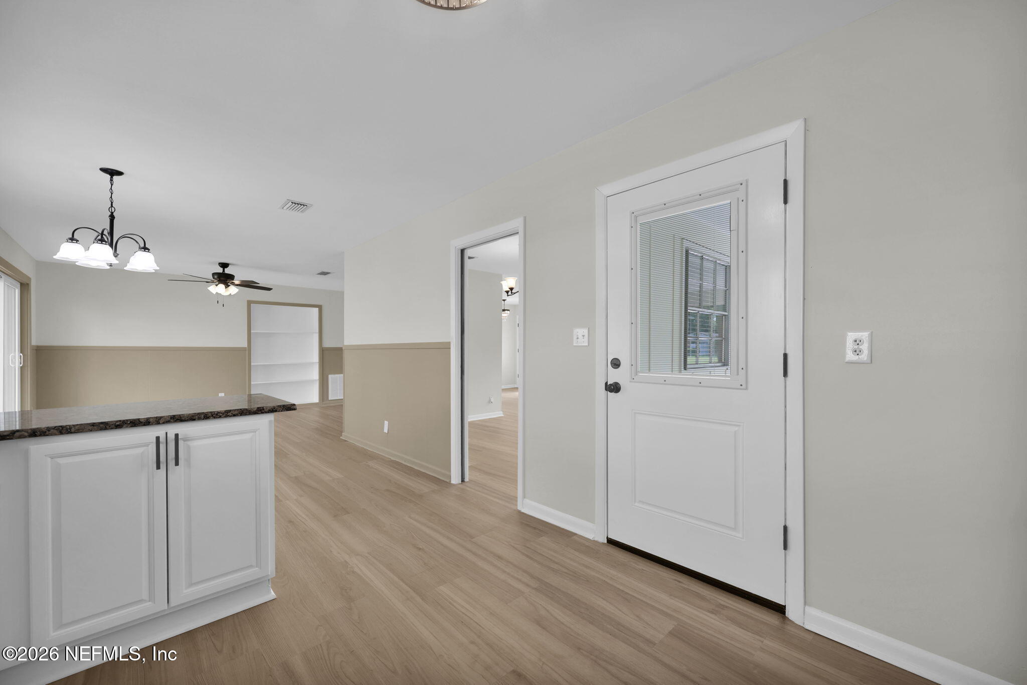 8544 Sanchez Road Jacksonville, FL 32217 - Photo 28 of 46 a view of a kitchen with wooden floor and a sink