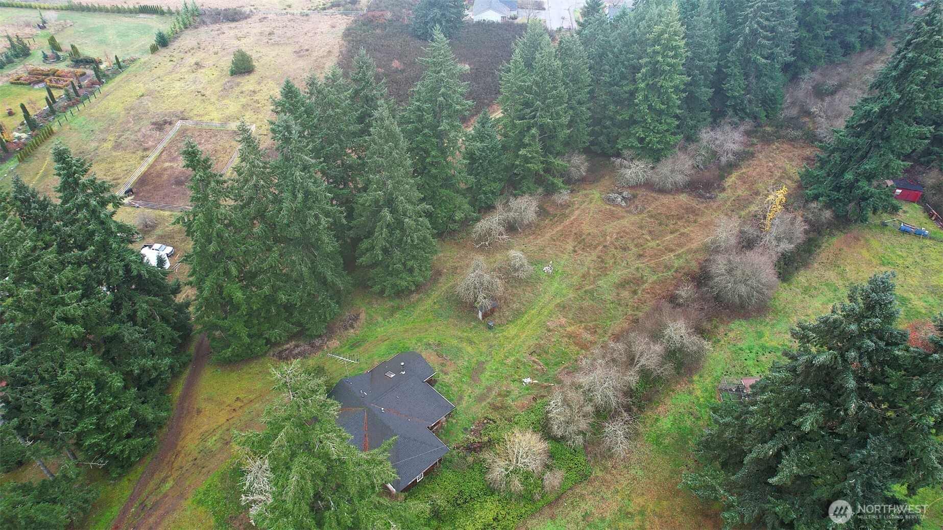 10524 Clark Road Southeast Yelm, WA 98597 - Photo 8 of 10 an aerial view of residential house with outdoor space