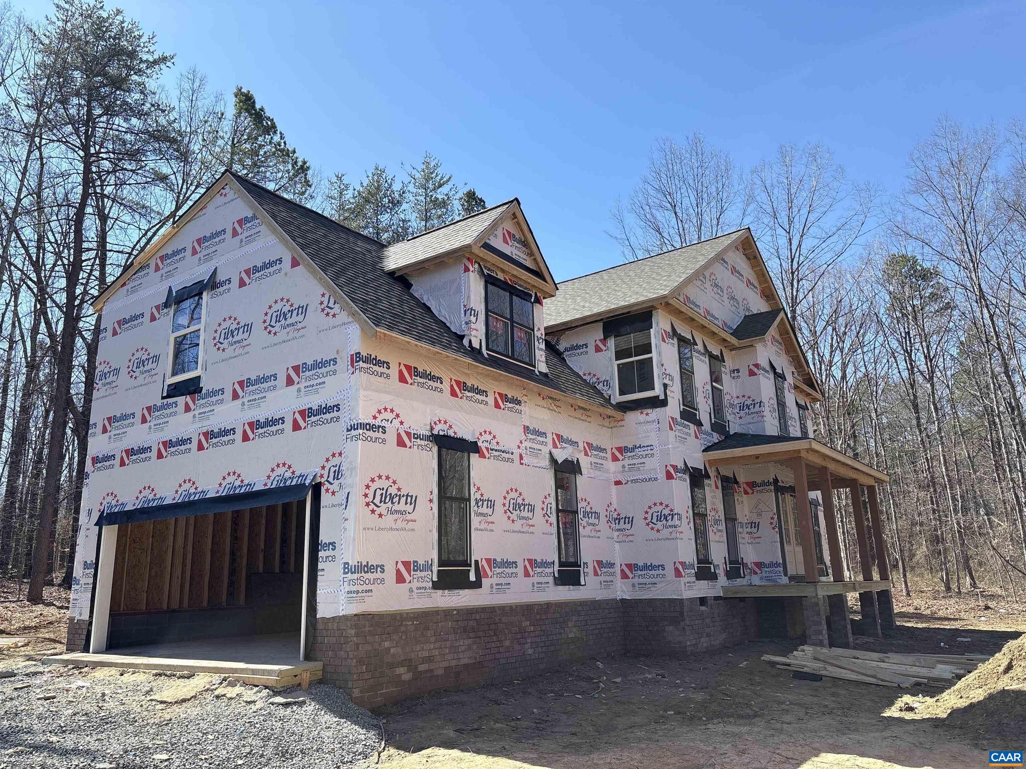 11675 West Jack Jouett Road Zion Crossroads, VA 22942 - Photo 3 of 33 a front view of a building with entryway