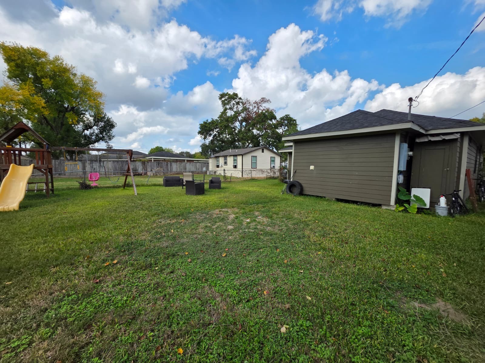 10015 Porto Rico Road Houston, TX 77041 - Photo 19 of 20 a view of a backyard with potted plants and large tree