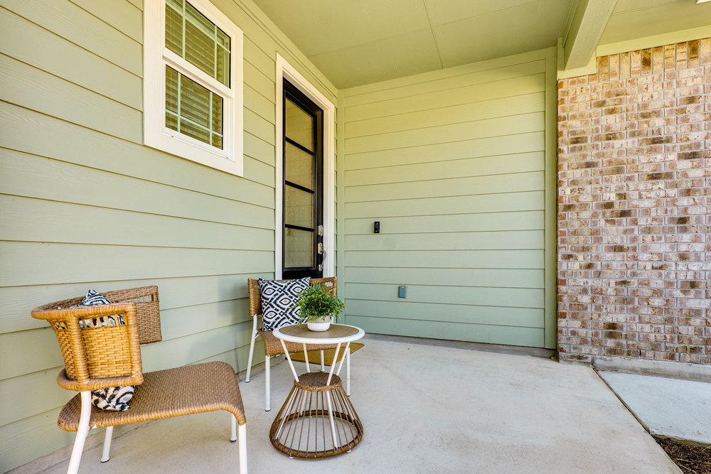 1107 Winifred Drive Austin, TX 78748 - Photo 4 of 40 The inviting front porch offers the perfect spot for morning coffee or quiet evenings.