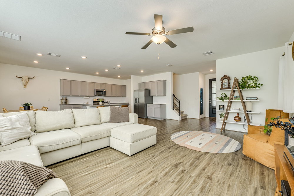 1107 Winifred Drive Austin, TX 78748 - Photo 5 of 40 Bright and open living area with seamless flow and easy connection to the kitchen and dining spaces.