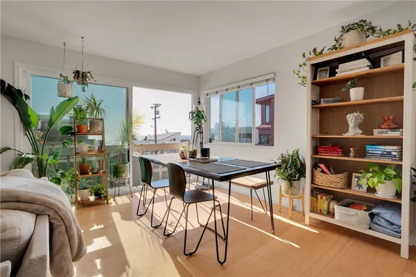 a kitchen with stainless steel appliances granite countertop a stove and cabinets