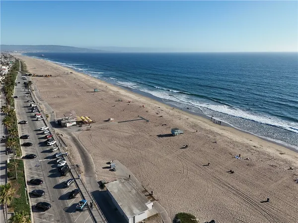 an aerial view of beach and city