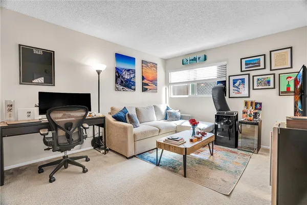 a bedroom with a bed and furniture
