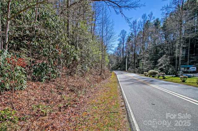 a view of a yard with swimming pool