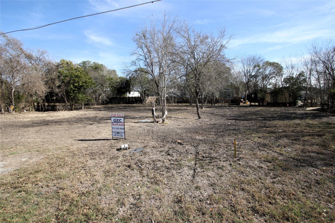 1104 Wichita Street Lockhart, TX 78644 - Photo 1 of 7 a backyard of a house with lots of green space