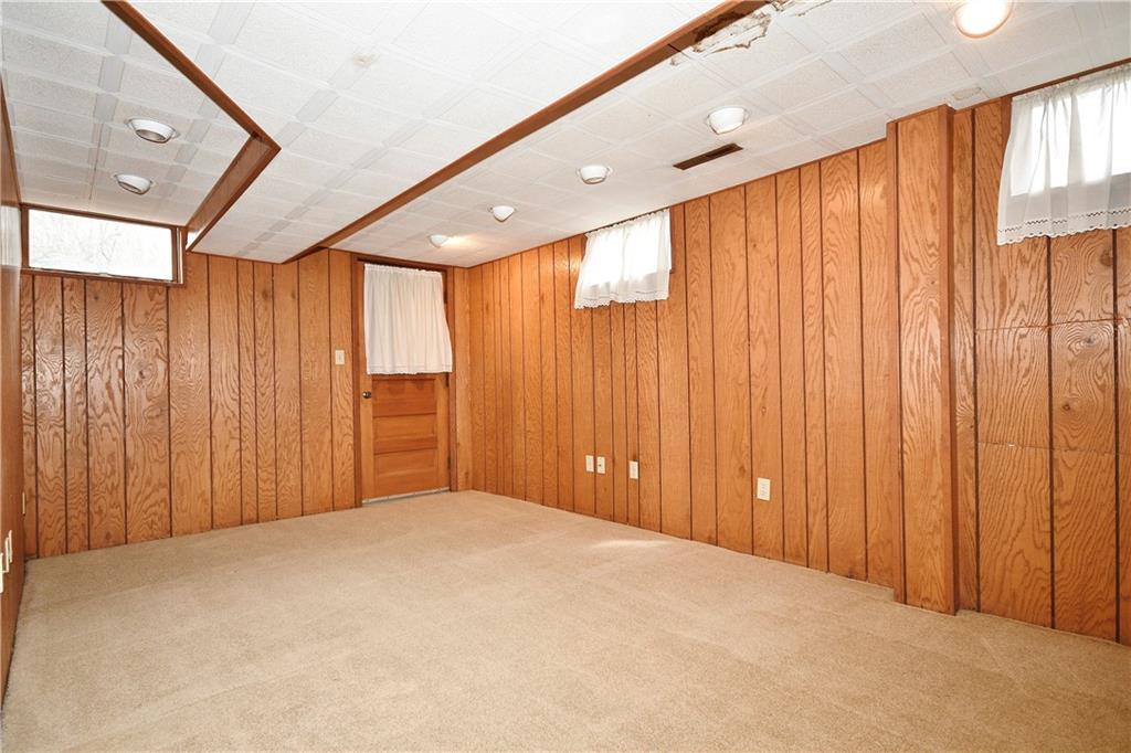 653 Filmore Road Pittsburgh, PA 15221 - Photo 18 of 23 a view of an empty room with a window