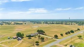 a swimming pool with some trees in the background