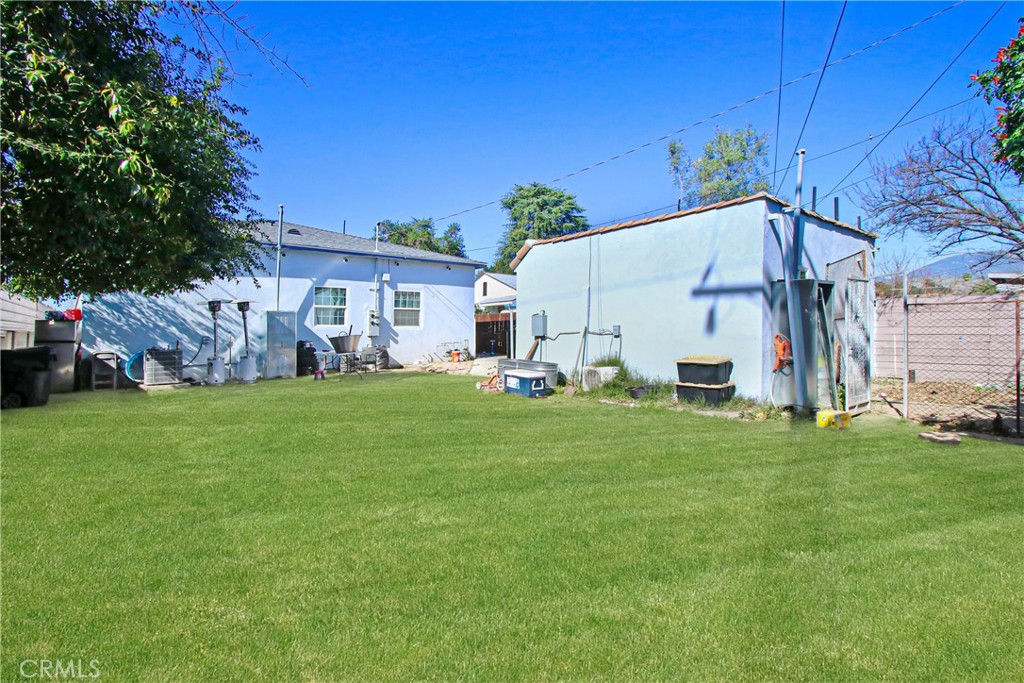 2249 Serrano Road North San Bernardino, CA 92405 - Photo 6 of 26 a view of a house with backyard