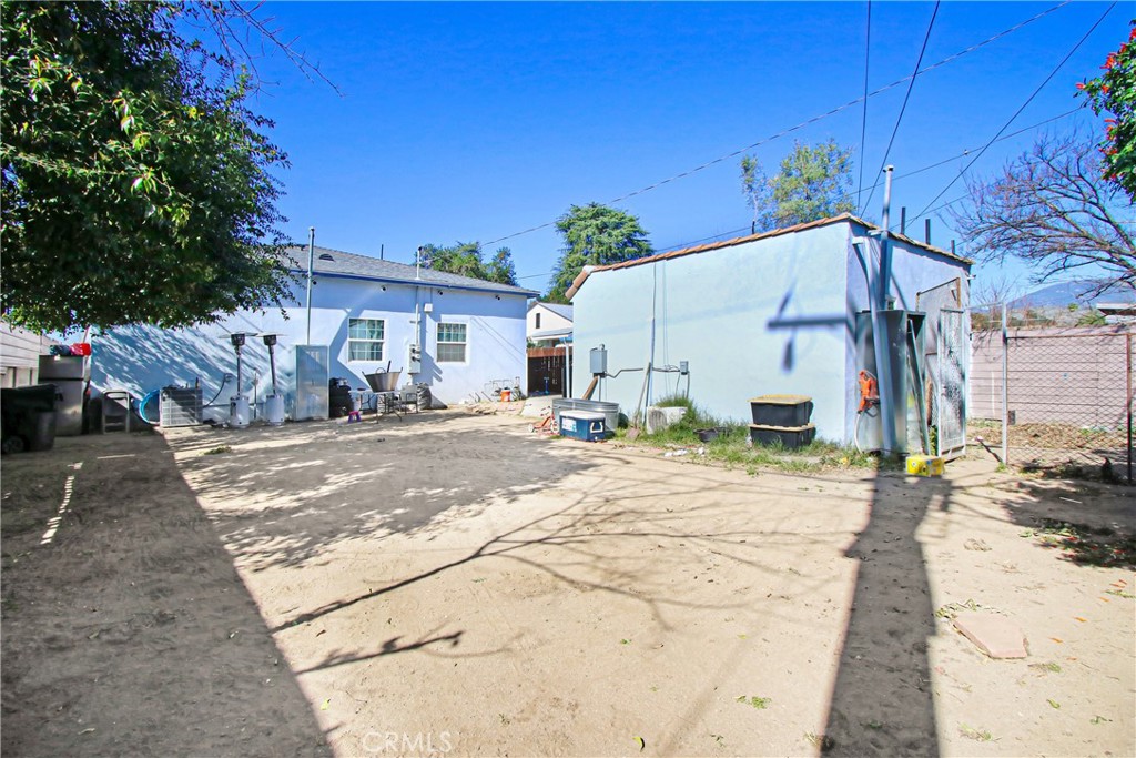 2249 Serrano Road North San Bernardino, CA 92405 - Photo 7 of 26 a view of a white house