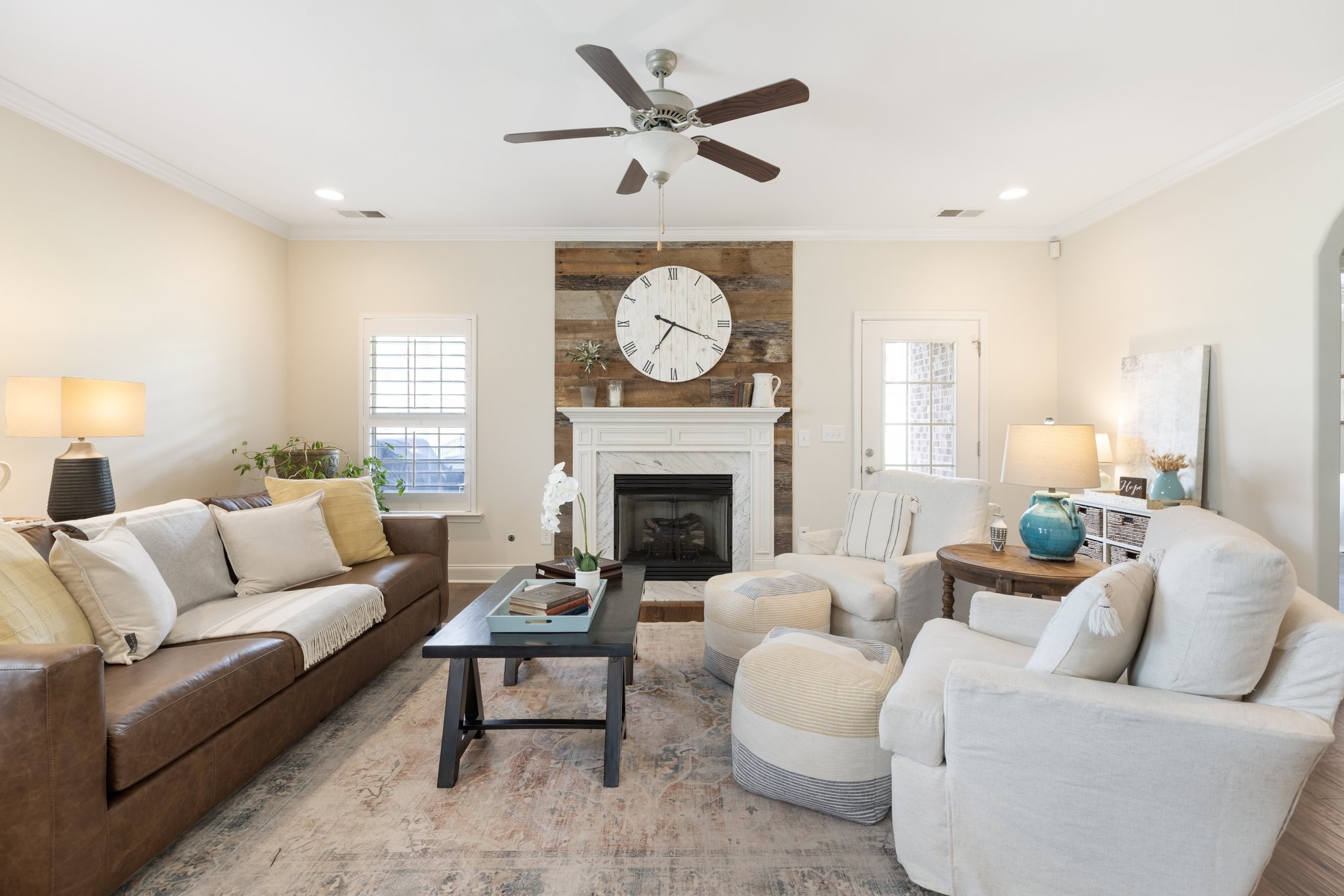 1044 Scouting Drive Franklin, TN 37064 - Photo 18 of 87 a living room with furniture a large window and a fireplace