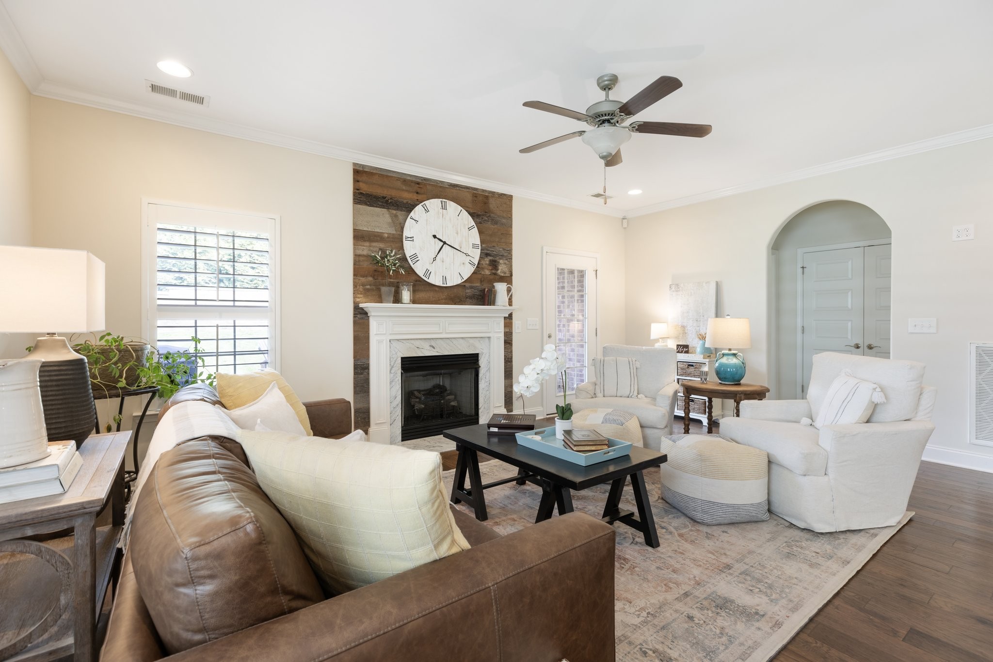 1044 Scouting Drive Franklin, TN 37064 - Photo 20 of 87 a living room with furniture a fireplace and a large window
