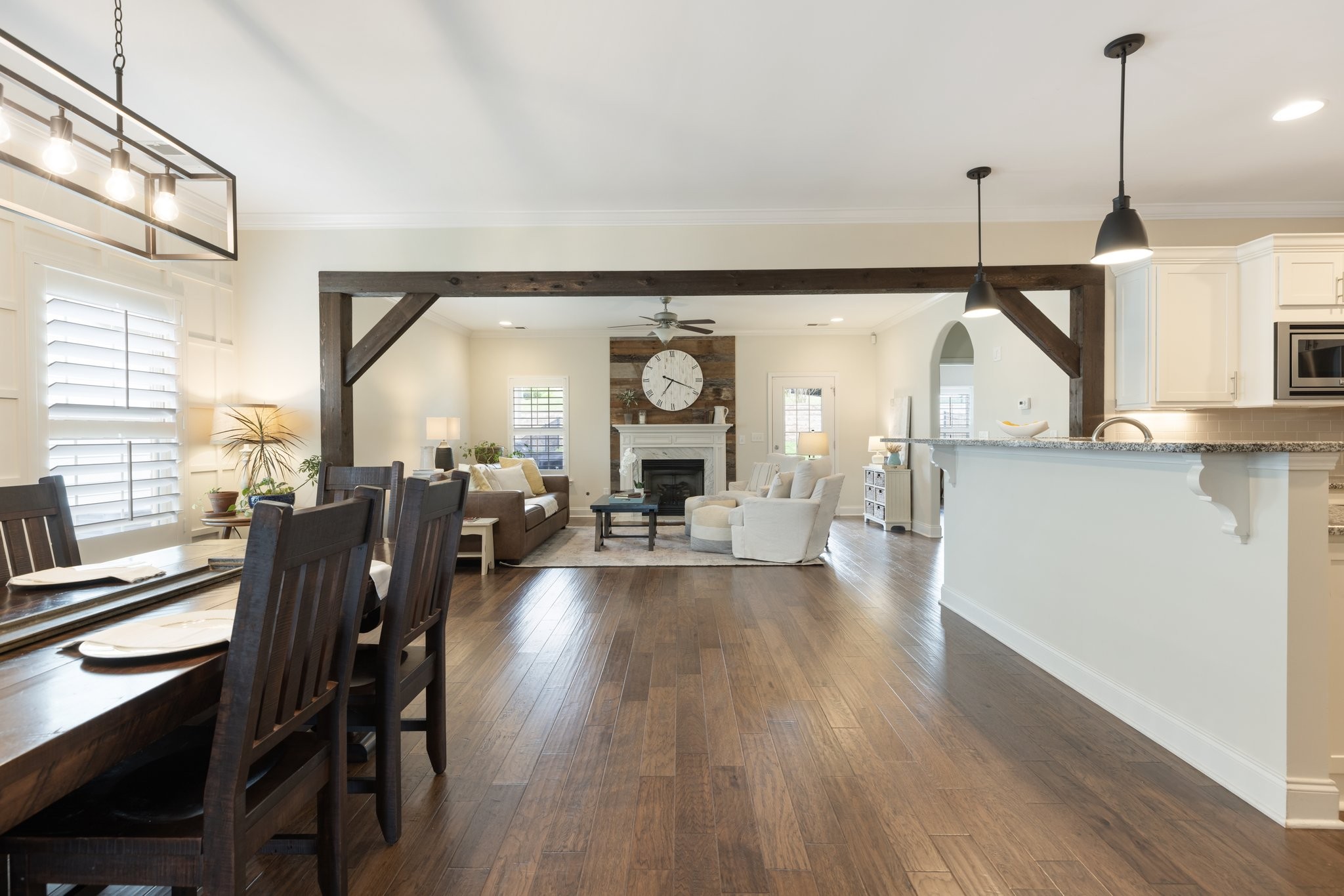 1044 Scouting Drive Franklin, TN 37064 - Photo 23 of 87 a living room with furniture a fireplace and large windows