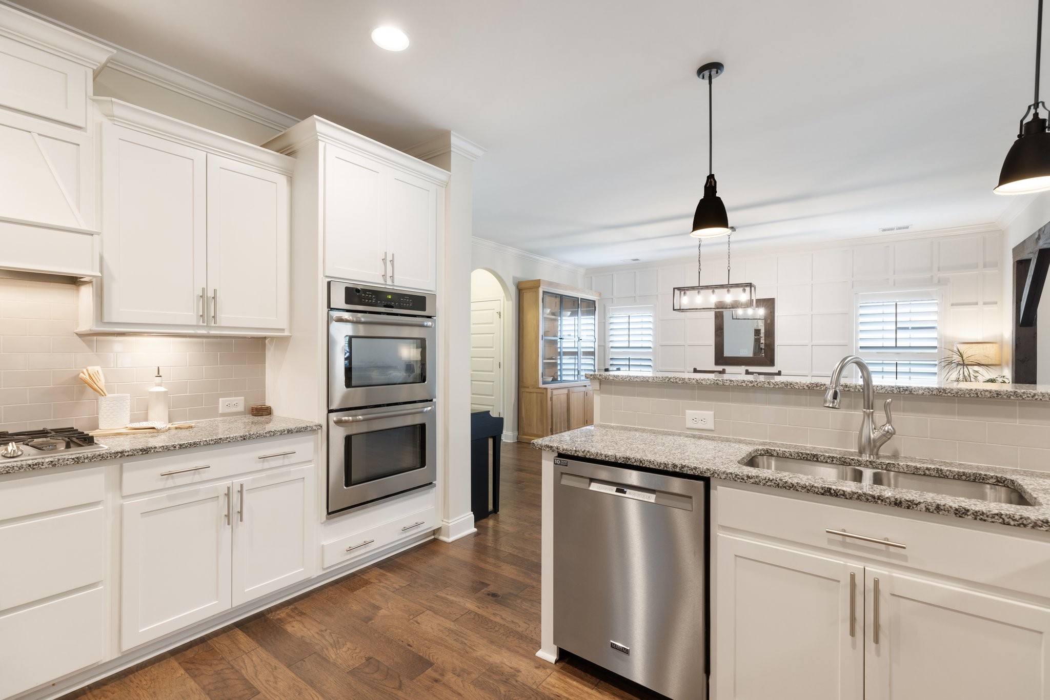 1044 Scouting Drive Franklin, TN 37064 - Photo 36 of 87 a kitchen with granite countertop stainless steel appliances a sink and cabinets