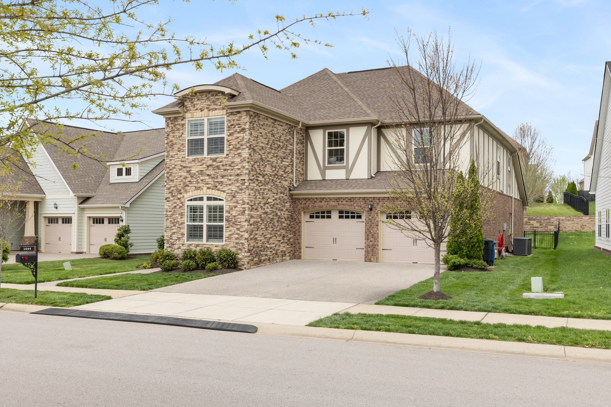 1044 Scouting Drive Franklin, TN 37064 - Photo 4 of 87 a front view of a house with a yard