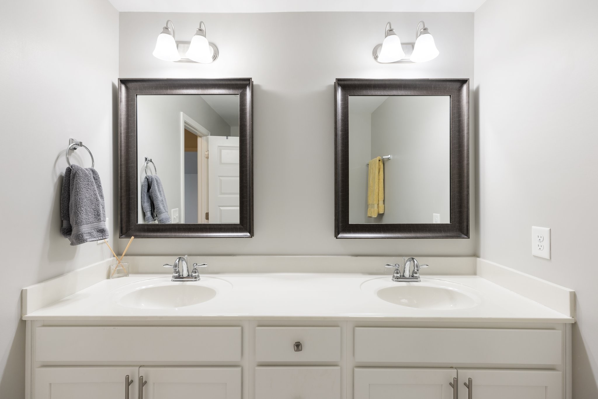 1044 Scouting Drive Franklin, TN 37064 - Photo 45 of 87 a bathroom with double vanity sinks and a mirror