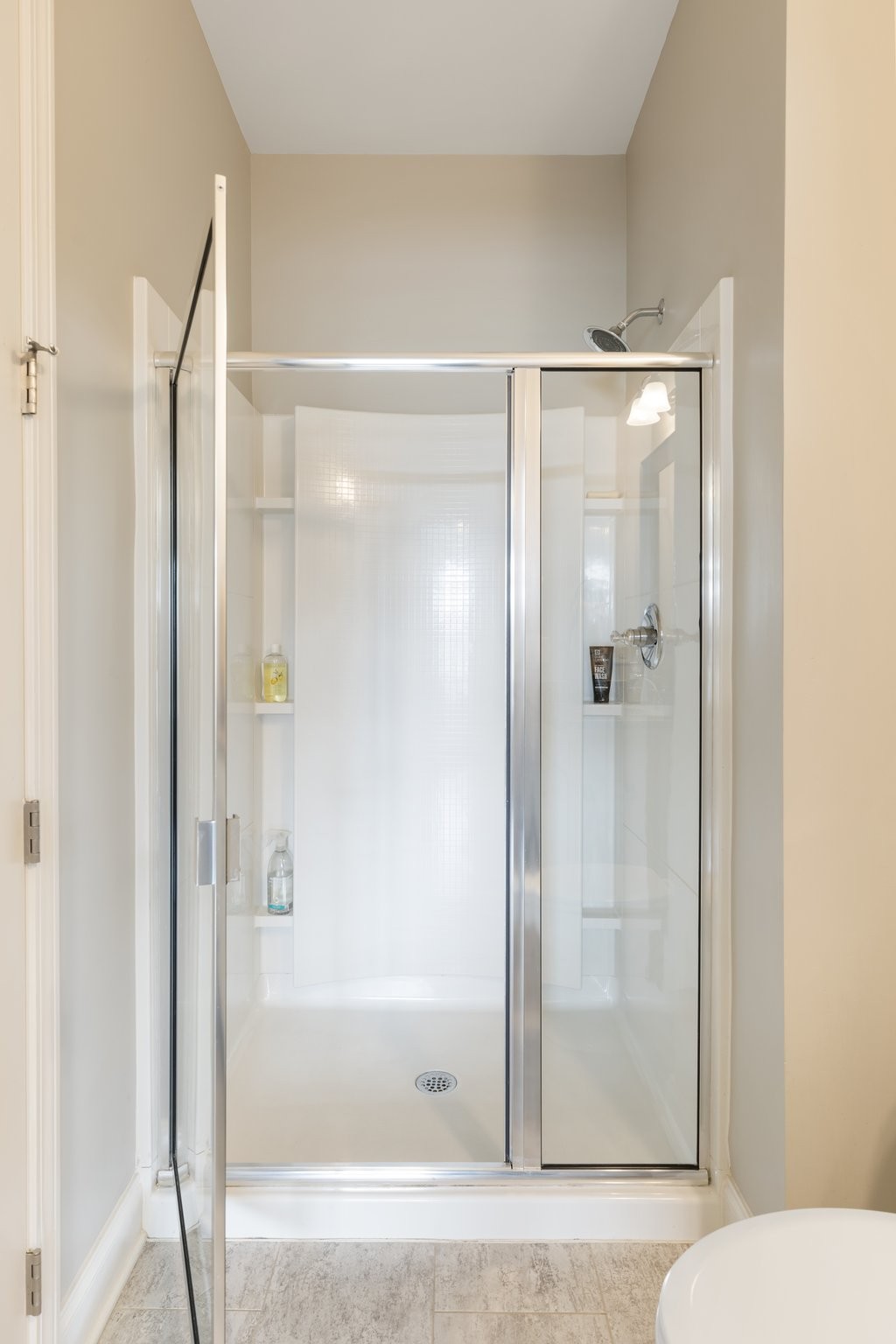 1044 Scouting Drive Franklin, TN 37064 - Photo 55 of 87 a bathroom with a shower and a glass door