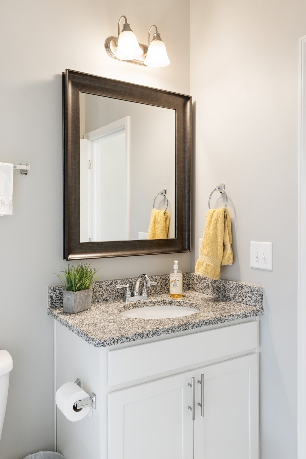 1044 Scouting Drive Franklin, TN 37064 - Photo 56 of 87 a bathroom with a granite countertop sink and a mirror