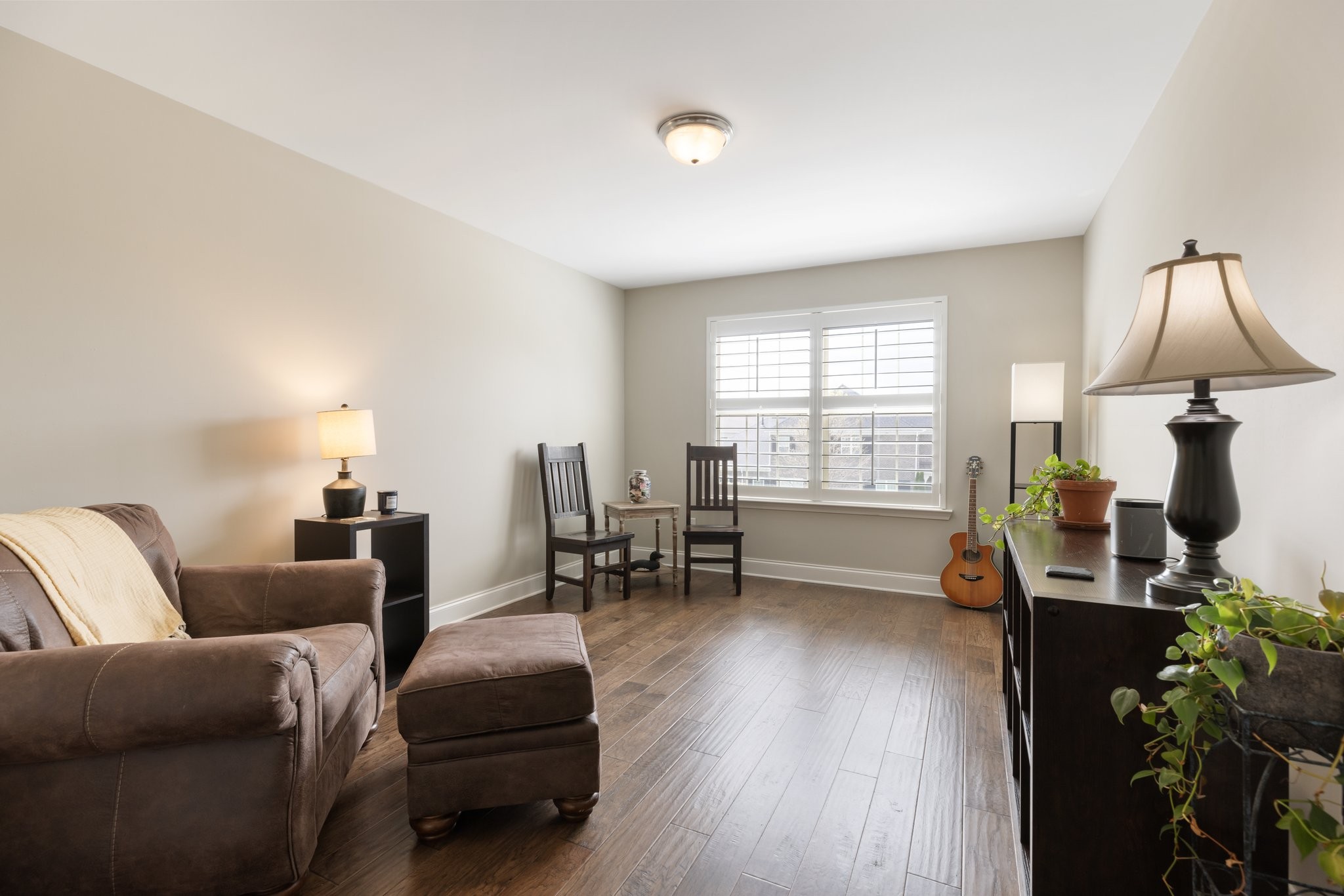 1044 Scouting Drive Franklin, TN 37064 - Photo 58 of 87 a living room with furniture and a flat screen tv with wooden floor
