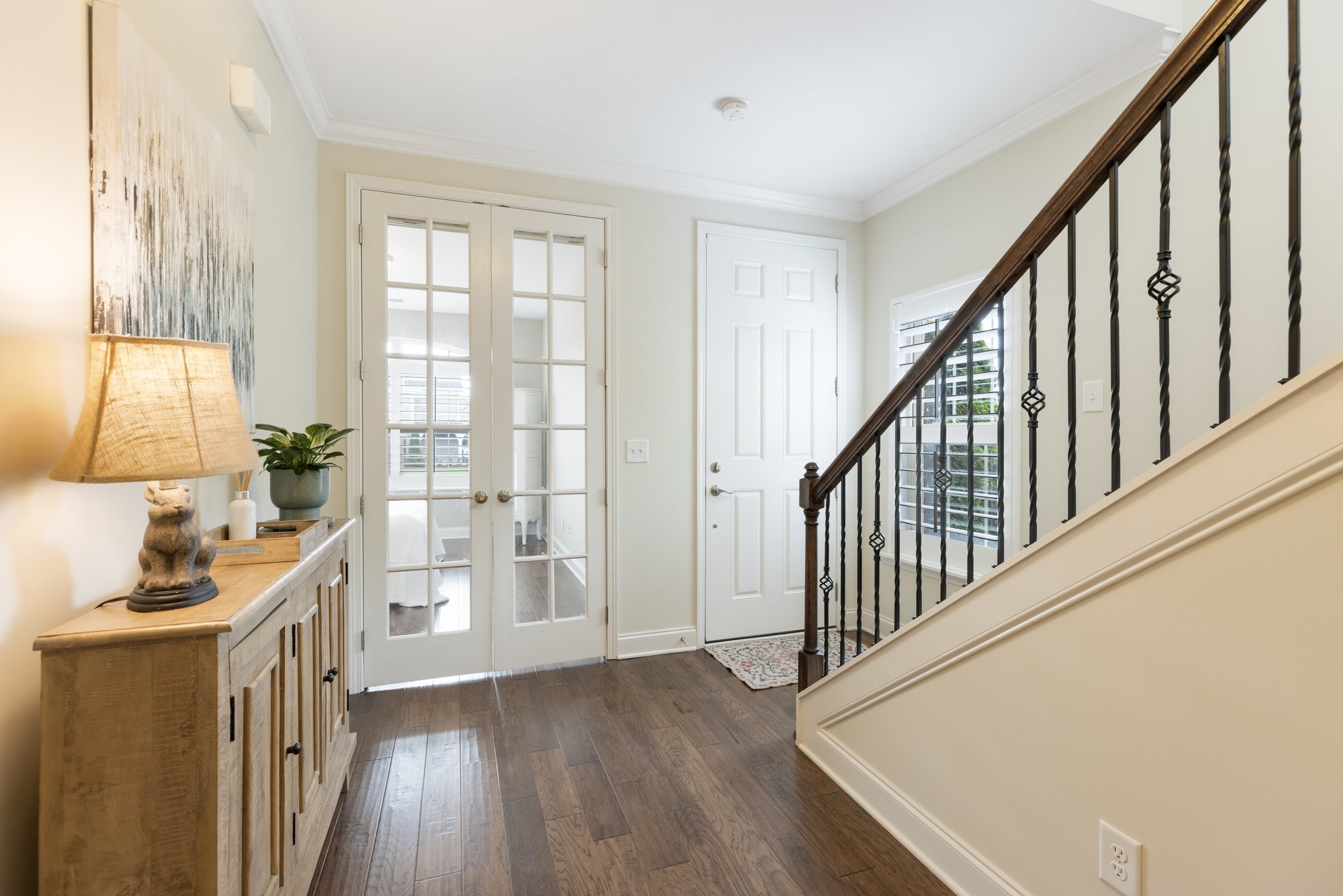 1044 Scouting Drive Franklin, TN 37064 - Photo 9 of 87 a view of an entryway with wooden floor and door