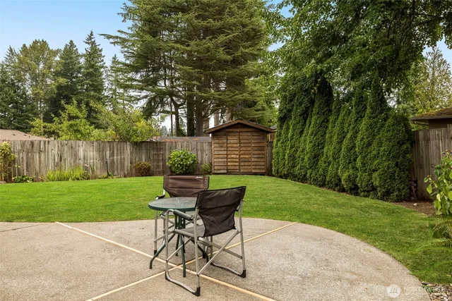 a garden view with a seating space