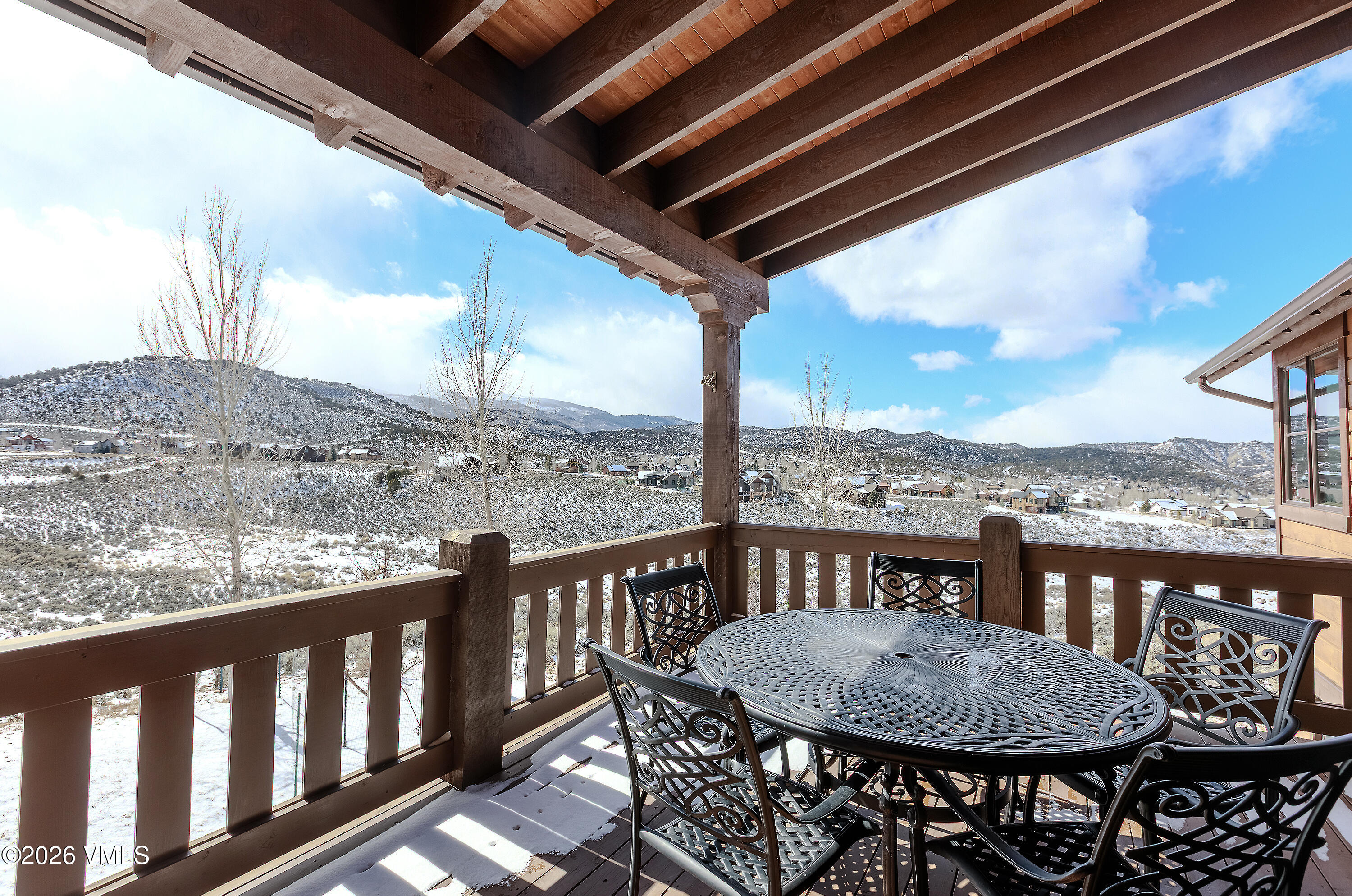 2753 East Haystacker Drive Eagle, CO 81631 - Photo 39 of 41 a view of a balcony with a table and chairs