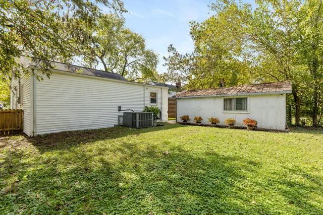 a house view with a backyard space