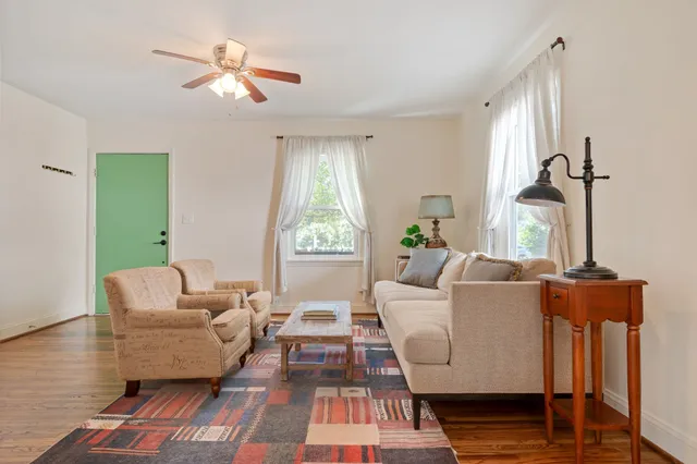 a living room with furniture and a window