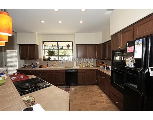4656 Monument Valley Road Las Vegas, NV 89129 - Photo 6 of 11 Kitchen.