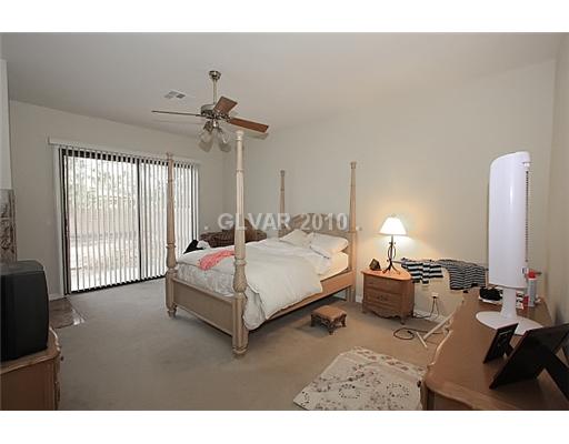 4656 Monument Valley Road Las Vegas, NV 89129 - Photo 7 of 11 Master Bedroom.