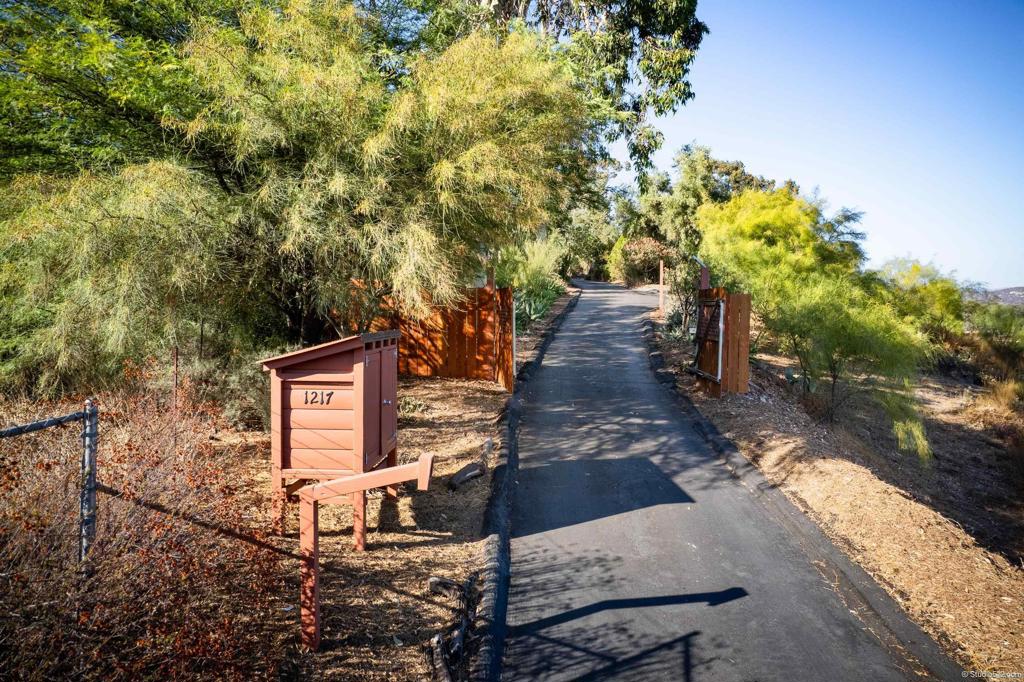 1217 Cedar Street Ramona, CA 92065 - Photo 3 of 42 As you pull up to the drive way there is the code box and a large package box for deliveries.