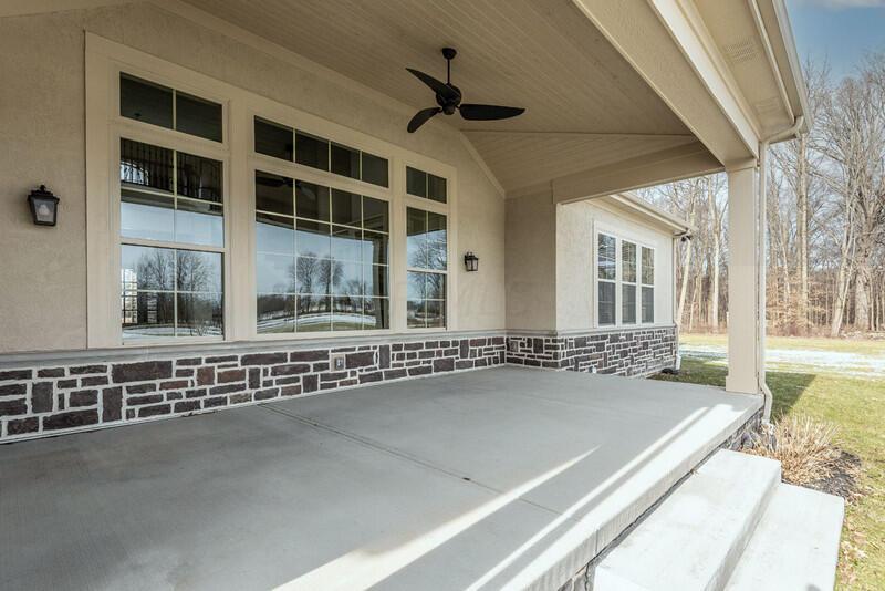 4459 Green Cook Road Johnstown, OH 43031 - Photo 10 of 103 EXTRA DEEP COVERED PORCHES WITH BATON CEILINGS AND POND VIEW