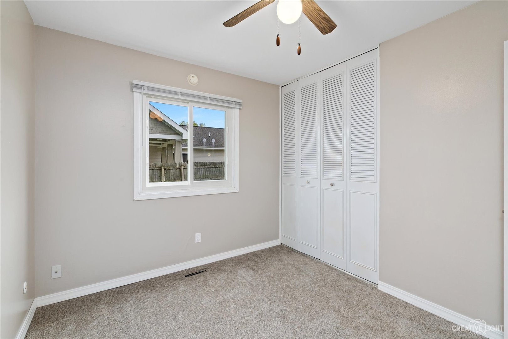 107 Heathgate Road Montgomery, IL 60538 - Photo 12 of 17 an empty room with a window