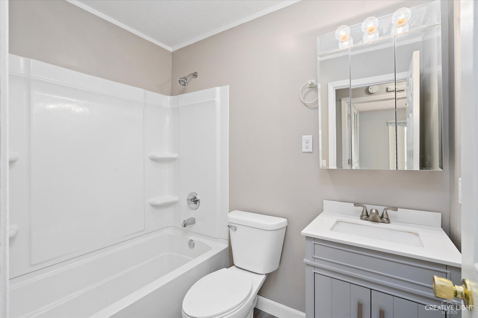 107 Heathgate Road Montgomery, IL 60538 - Photo 15 of 17 a bathroom with a sink toilet and shower