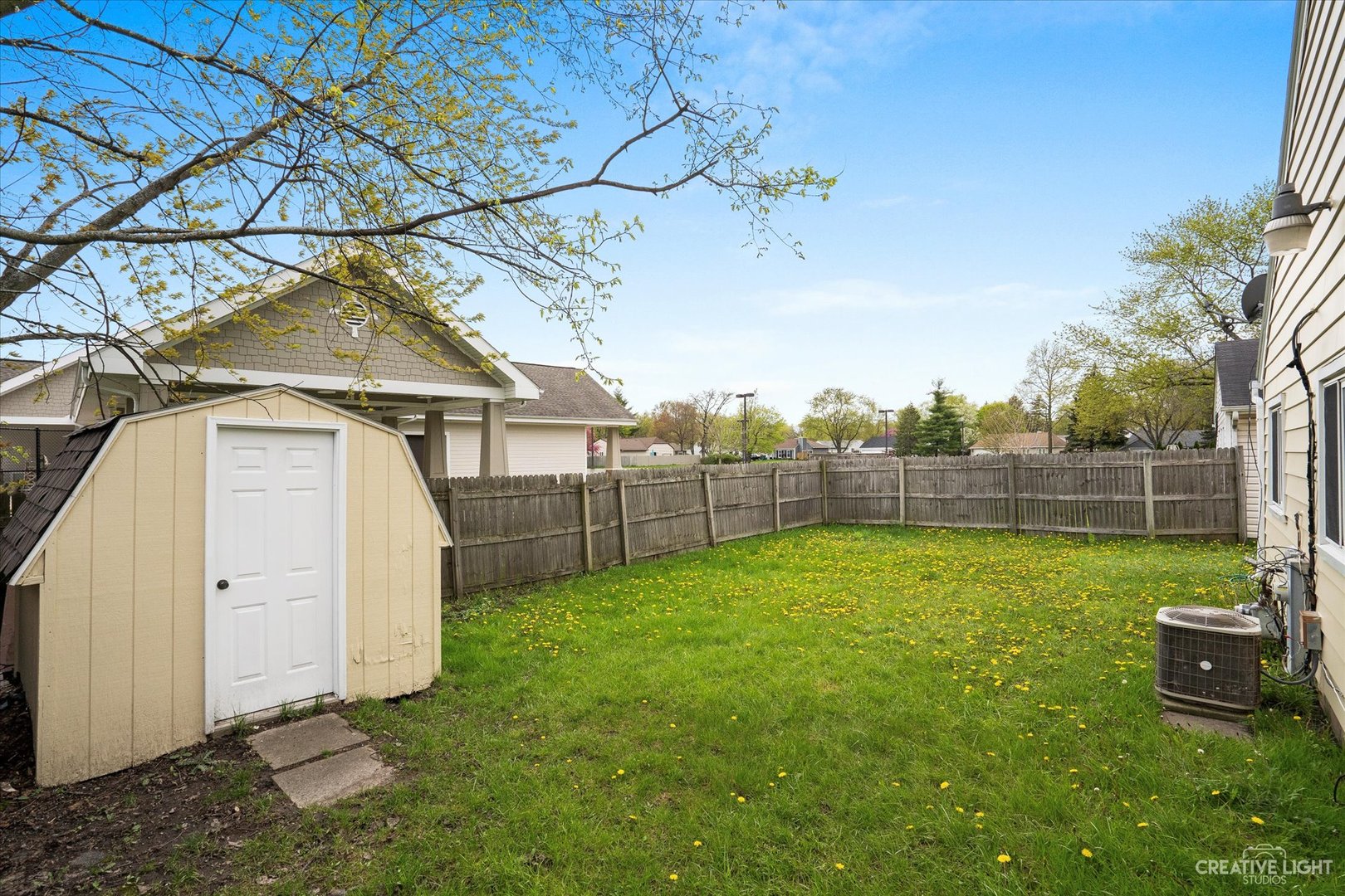 107 Heathgate Road Montgomery, IL 60538 - Photo 17 of 17 a view of a backyard with a garden