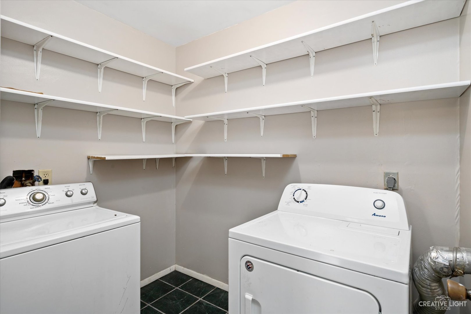 107 Heathgate Road Montgomery, IL 60538 - Photo 8 of 17 a utility room with dryer and washer