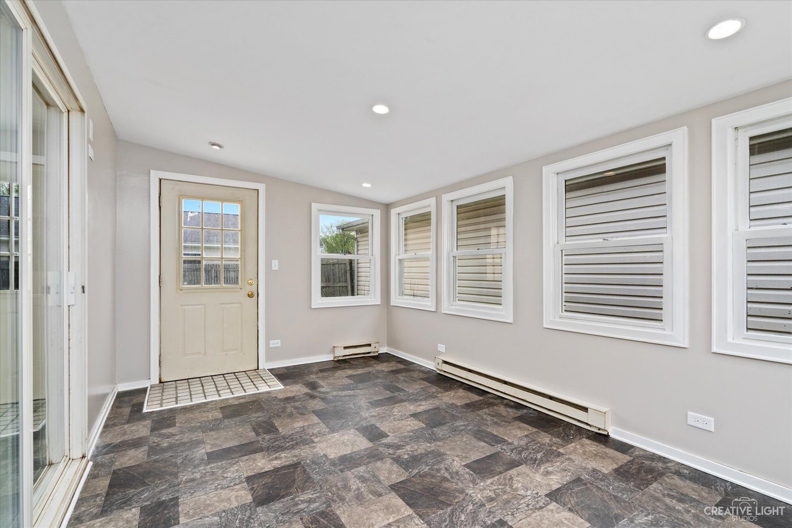 107 Heathgate Road Montgomery, IL 60538 - Photo 9 of 17 a view of an empty room with a window