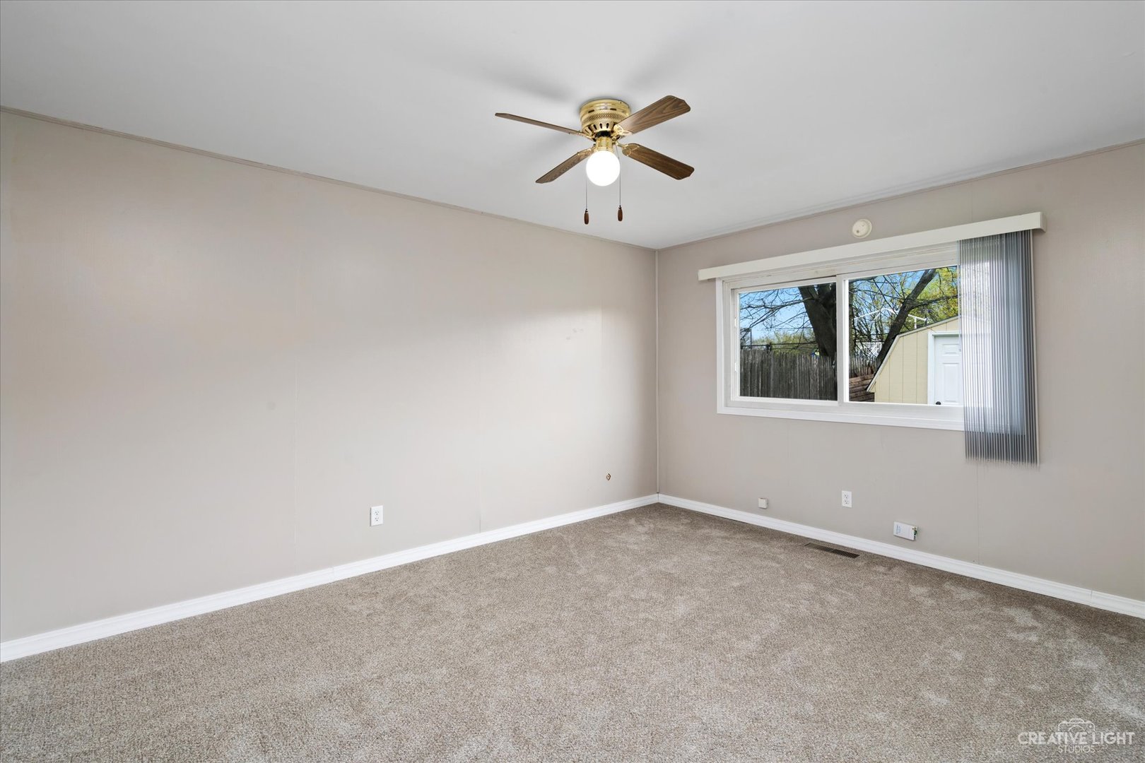 107 Heathgate Road Montgomery, IL 60538 - Photo 10 of 17 a view of an empty room with a window